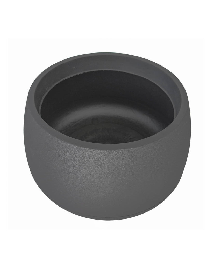 Angled view of the low rise round plant pot showing the inside rim, and depth. Ultra modern architectural design in colour lead (black)