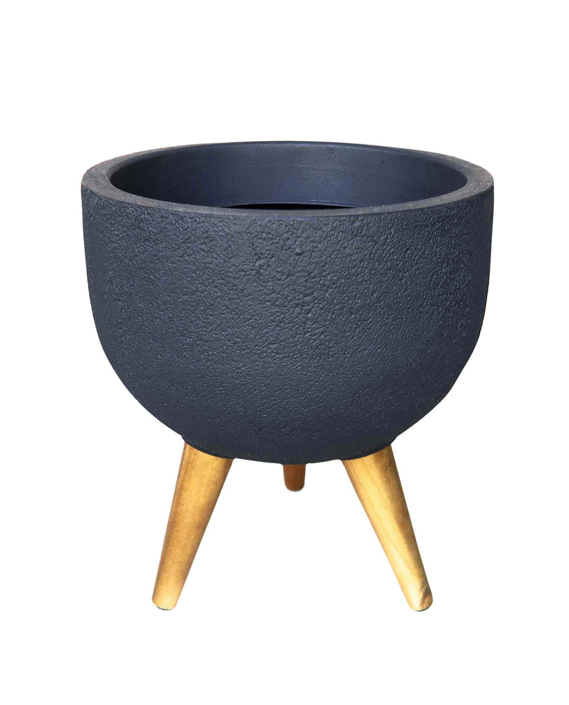 Round Planter with three wooden legs. Stylish and modern. Indoor or outdoor. Floor or tabletop. Textured finish. Lightweight poly carbon